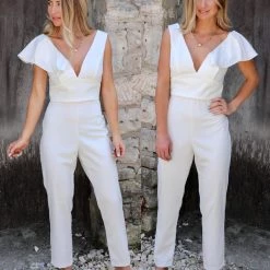 The Lace Cactus Apparel White One Ruffle Shoulder Jumpsuit