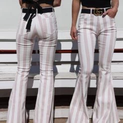 Saints + Hearts Apparel Blush + Ivory Striped Raw Hem Flare Jeans