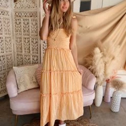 Aaron & Amber Apparel Odette Orange Plaid Smocked Tie Strap Ruffle Dress