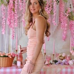 Le Leis Apparel Prestyn Peach Ruched Mini Dress